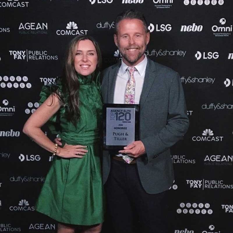 PRNews Agency Elite Top 120 Pugh & Tiller accepting PRNews Agency Elite Top 120 Award.